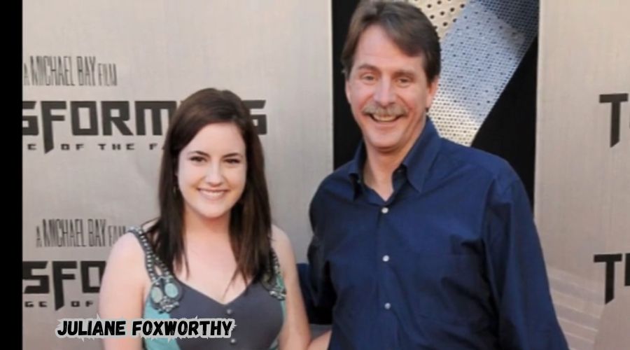 Juliane Foxworthy smiling warmly at a public event, showcasing her friendly personality.