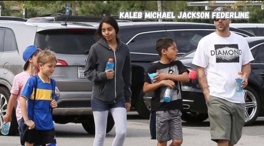 Kaleb Michael Jackson Federline smiling outdoors in casual wear