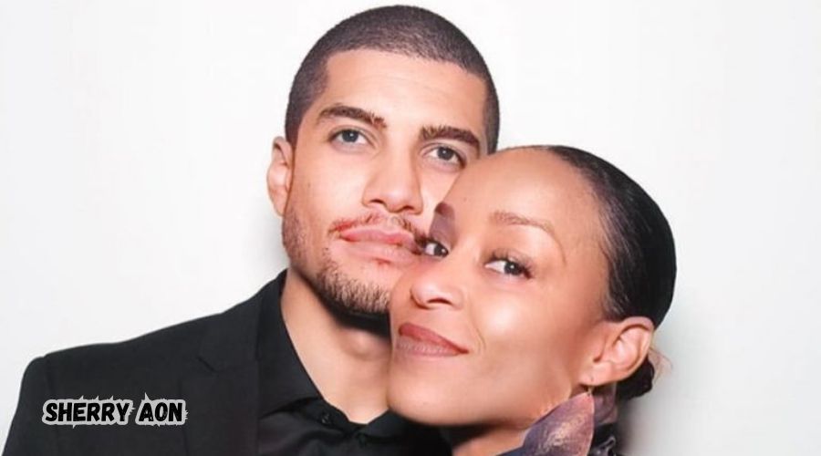 Sherry Aon smiling alongside her husband Rick Gonzalez at a public event.